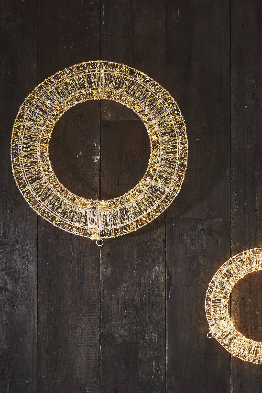 Decorative circular lights on a wooden surface