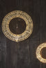 Decorative circular lights on a wooden surface