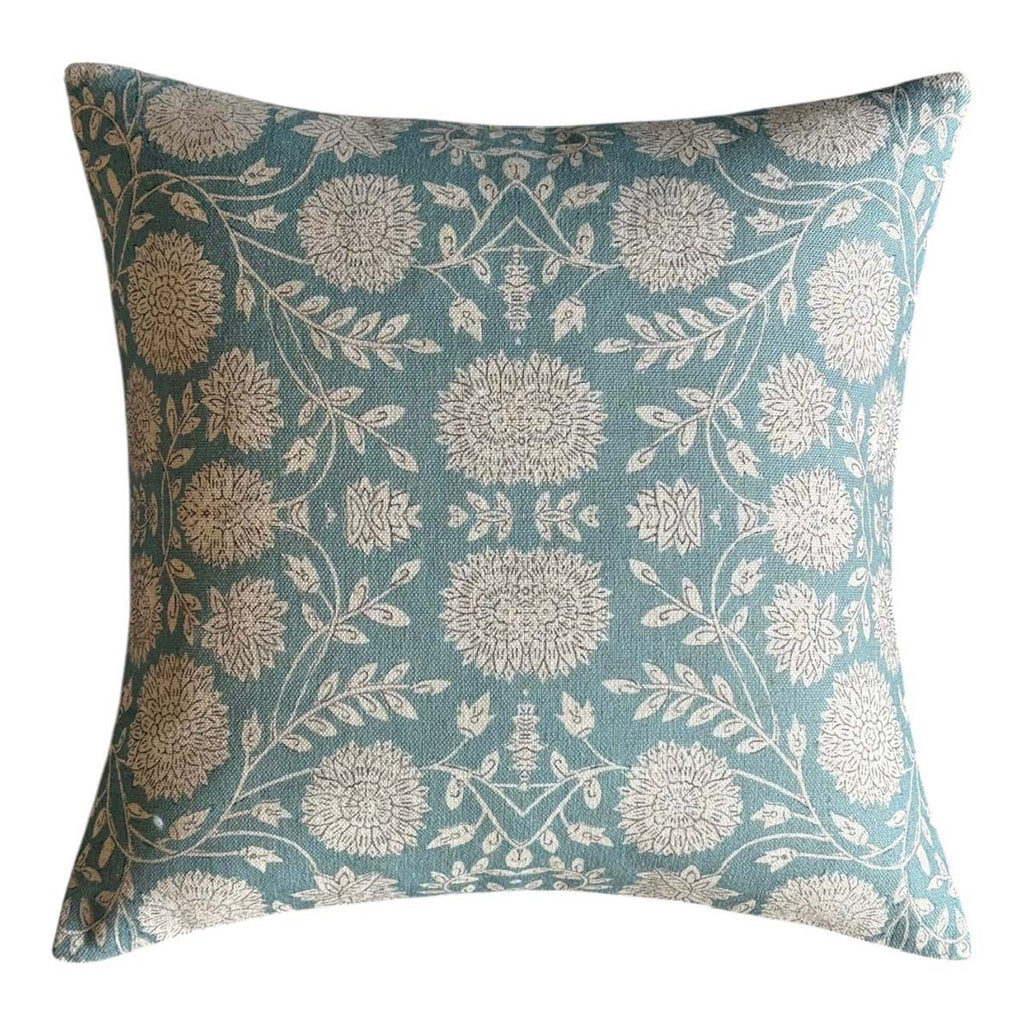 Bellora sky blue cushion showing cream flowers and curling leafy stems