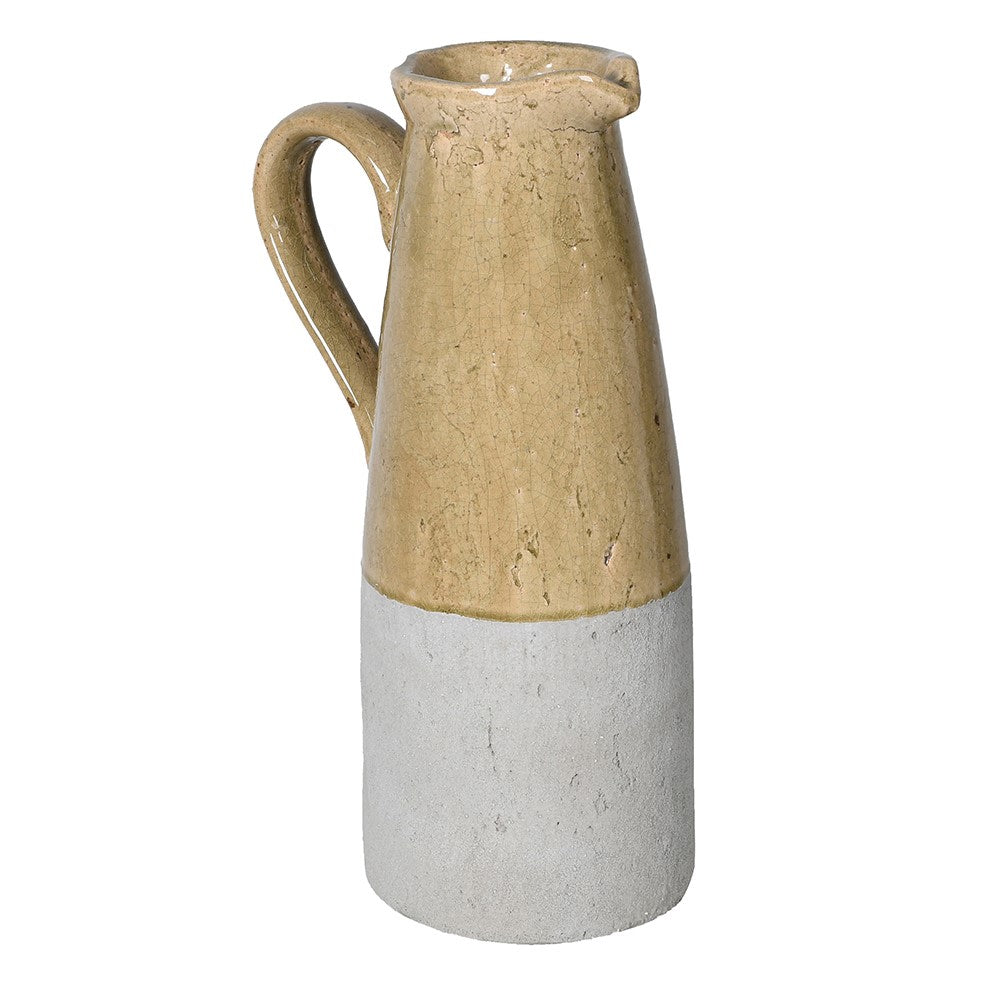 Ceramic pitcher with a two-tone design on a white background
