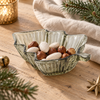 Noelle glass Christmas tree dish styled with festive treats on a wooden table